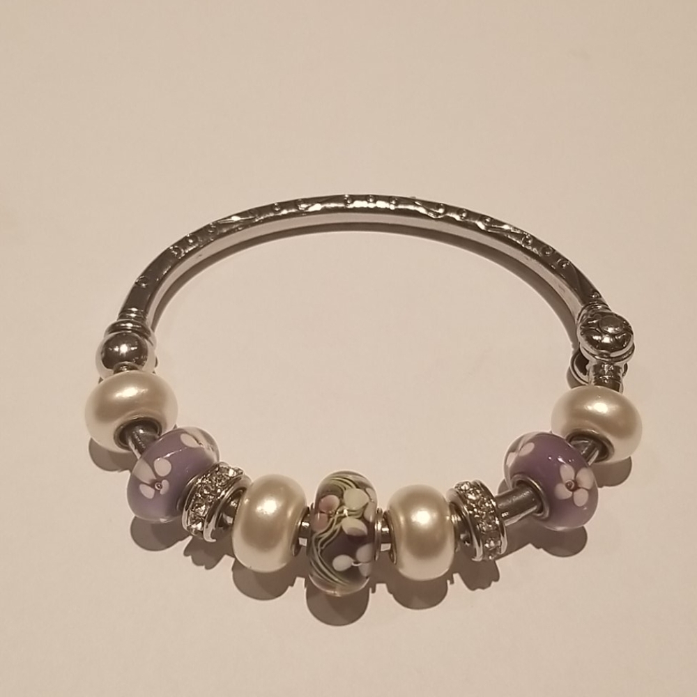 Silver color bangle bracelet with sliding charms